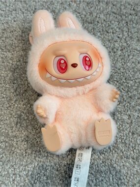 Pink seated labubu original